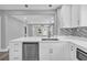 A modern kitchen with stainless steel appliances, white countertops, and an open layout at 85 Ollie St, Atlanta, GA 30314