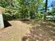 Expansive backyard shaded by mature trees, offering a peaceful and private outdoor retreat at 850 Greenhedge Dr, Stone Mountain, GA 30088