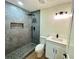Modern bathroom with tiled walk-in shower and stylish fixtures at 850 Greenhedge Dr, Stone Mountain, GA 30088