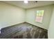 Neutral bedroom with carpet floors and one window at 850 Greenhedge Dr, Stone Mountain, GA 30088