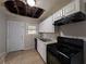 Outdated kitchen with damage to the ceiling needing a full renovation at 2904 Glenwood Se Ave, Atlanta, GA 30317
