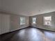 Another view of the living room with natural light and hardwood floors at 2904 Glenwood Se Ave, Atlanta, GA 30317