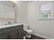 Cozy bathroom featuring a gray vanity with a white countertop, offering style and functionality at 4961 Thornwood Nw Trce, Acworth, GA 30102