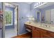 Bright bathroom with vanity and adjacent toilet room at 4961 Thornwood Nw Trce, Acworth, GA 30102
