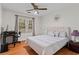 Bedroom with desk and plush upholstered headboard at 4961 Thornwood Nw Trce, Acworth, GA 30102