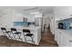 Bright kitchen featuring a quartz island, stainless steel appliances, and white cabinetry at 4961 Thornwood Nw Trce, Acworth, GA 30102