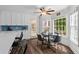 Eat in kitchen with light cabinets, stainless appliances and large windows at 4961 Thornwood Nw Trce, Acworth, GA 30102