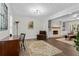 Spacious living room with hardwood floors, a fireplace, and built-in shelving, perfect for entertaining at 4961 Thornwood Nw Trce, Acworth, GA 30102