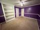 Bedroom with painted walls, ceiling fan, closet, and built-in shelving at 1855 Tribble Ridge Dr, Lawrenceville, GA 30045