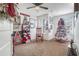 Cozy bedroom with neutral carpet, charming rocking chair, and fun decorations. Go Dawgs! at 211 N Auburn Landing Pl, Auburn, GA 30011