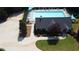 Aerial view of community pool and clubhouse with parking at 29 Sedgefield Overlook, Dallas, GA 30157