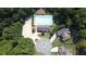 Aerial view of the community pool, clubhouse and surrounding homes at 29 Sedgefield Overlook, Dallas, GA 30157