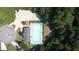 Aerial view of community pool, clubhouse, and surrounding greenery at 29 Sedgefield Overlook, Dallas, GA 30157