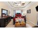 Bedroom with dark furniture, trey ceiling, ceiling fan, and beige carpet at 29 Sedgefield Overlook, Dallas, GA 30157