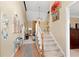 Inviting two-story foyer with elegant staircase, decorative art, and light-filled open floor plan at 29 Sedgefield Overlook, Dallas, GA 30157