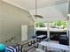 Covered patio with picnic tables, ceiling fan, and a view of the community's well-maintained landscape at 29 Sedgefield Overlook, Dallas, GA 30157