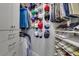 Organized closet with shelving for shoes, hats, and hanging clothes at 325 E Paces Ferry Ne Rd # 1910, Atlanta, GA 30305