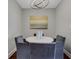 Modern dining room featuring a decorative light fixture and painting at 325 E Paces Ferry Ne Rd # 1910, Atlanta, GA 30305