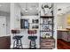 Stylish kitchen featuring granite countertops, stainless steel appliances, modern decor, and a convenient breakfast bar at 325 E Paces Ferry Ne Rd # 1910, Atlanta, GA 30305