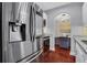 Modern kitchen featuring stainless steel appliances, granite countertops, and hardwood floors at 325 E Paces Ferry Ne Rd # 1910, Atlanta, GA 30305