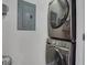Modern, stackable laundry machines and utility closet in the condo at 325 E Paces Ferry Ne Rd # 1910, Atlanta, GA 30305