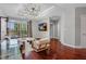 Inviting living room with balcony access, hardwood floors, and modern lighting, perfect for relaxing and entertaining at 325 E Paces Ferry Ne Rd # 1910, Atlanta, GA 30305