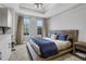 Stylish main bedroom with large windows, built-in cabinets, and decor at 325 E Paces Ferry Ne Rd # 1910, Atlanta, GA 30305