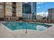 Sparkling pool with lounge chairs and city views, perfect for relaxing and enjoying the outdoors at 325 E Paces Ferry Ne Rd # 1910, Atlanta, GA 30305