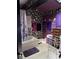 Bathroom with a tub, shower and unique floral wallpaper, storage shelves at 3090 Alberta Dr, Marietta, GA 30062