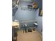 Blue walk-in closet featuring shelves and storage space, providing plenty of room for organization at 3090 Alberta Dr, Marietta, GA 30062