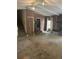 Open living room with a fireplace, two doorways and a window with curtains at 3090 Alberta Dr, Marietta, GA 30062