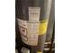 A water heater with many stickers on it at 3090 Alberta Dr, Marietta, GA 30062