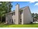 Exterior view of the back of the house highlighting the yard and neutral siding at 3405 Summer Brooke Way, Union City, GA 30291