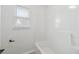 Bathroom with white shower-tub combo and a window at 3405 Summer Brooke Way, Union City, GA 30291