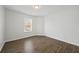 Bedroom with wood-look vinyl floors, recessed lighting, and a window at 3405 Summer Brooke Way, Union City, GA 30291