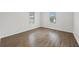 Bedroom with wood-look vinyl floors and windows offering natural light at 3405 Summer Brooke Way, Union City, GA 30291