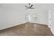 Bright bedroom with hardwood floors, ceiling fan, and two windows providing natural light at 3405 Summer Brooke Way, Union City, GA 30291