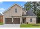 Charming two-story home with brick and siding, featuring a two-car garage and well-manicured lawn at 3405 Summer Brooke Way, Union City, GA 30291