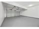 Spacious two car garage with white doors and painted floor at 3405 Summer Brooke Way, Union City, GA 30291