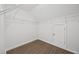 Spacious walk-in closet with ample storage space and wire shelving with wood-look vinyl floors at 3405 Summer Brooke Way, Union City, GA 30291