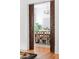 Dining area visible through opened classic, sliding wood doors at 694 Peeples Sw St, Atlanta, GA 30310