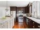 Kitchen featuring a large island, granite countertops, stainless steel appliances, and tile backsplash at 694 Peeples Sw St, Atlanta, GA 30310