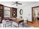 Bright home office with dark stained wood trim, built in bookshelves, and hardwood floors at 694 Peeples Sw St, Atlanta, GA 30310