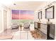 Modern bathroom with floor-to-ceiling windows and city views at 1280 W Peachtree Nw St # 4003, Atlanta, GA 30309