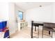 Bright room with a small window, desk, and room for storage or play at 1280 W Peachtree Nw St # 4003, Atlanta, GA 30309