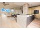 Contemporary kitchen featuring a marble island and stainless steel appliances at 1280 W Peachtree Nw St # 4003, Atlanta, GA 30309