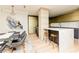 Modern kitchen with sleek appliances, breakfast bar, and open dining area at 1280 W Peachtree Nw St # 4003, Atlanta, GA 30309