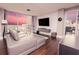 Upscale living room with floor-to-ceiling windows, sleek furniture, and access to a balcony with city views at 1280 W Peachtree Nw St # 4003, Atlanta, GA 30309