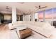 Open floor plan features a comfortable living area with a modern kitchen and city views at 1280 W Peachtree Nw St # 4003, Atlanta, GA 30309