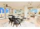Bright, open-concept living room with floor-to-ceiling windows and city views at 1280 W Peachtree Nw St # 4003, Atlanta, GA 30309